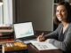 How Self-Published Authors Make $50K-$200K on Amazon: The Complete System Stack of self-published books with laptop showing Amazon KDP dashboard representing successful indie author publishing business model